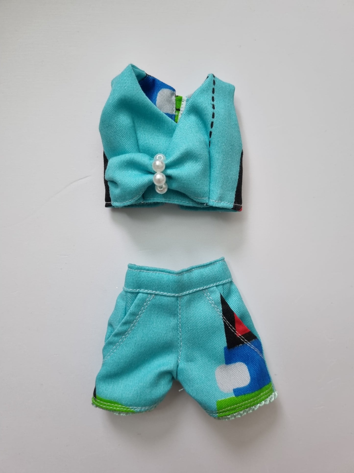 Blue suit for Barbie doll.
