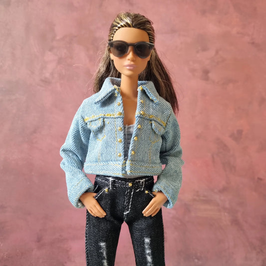 Barbie doll street style look with light blue denim jacket and black jeans outfit.