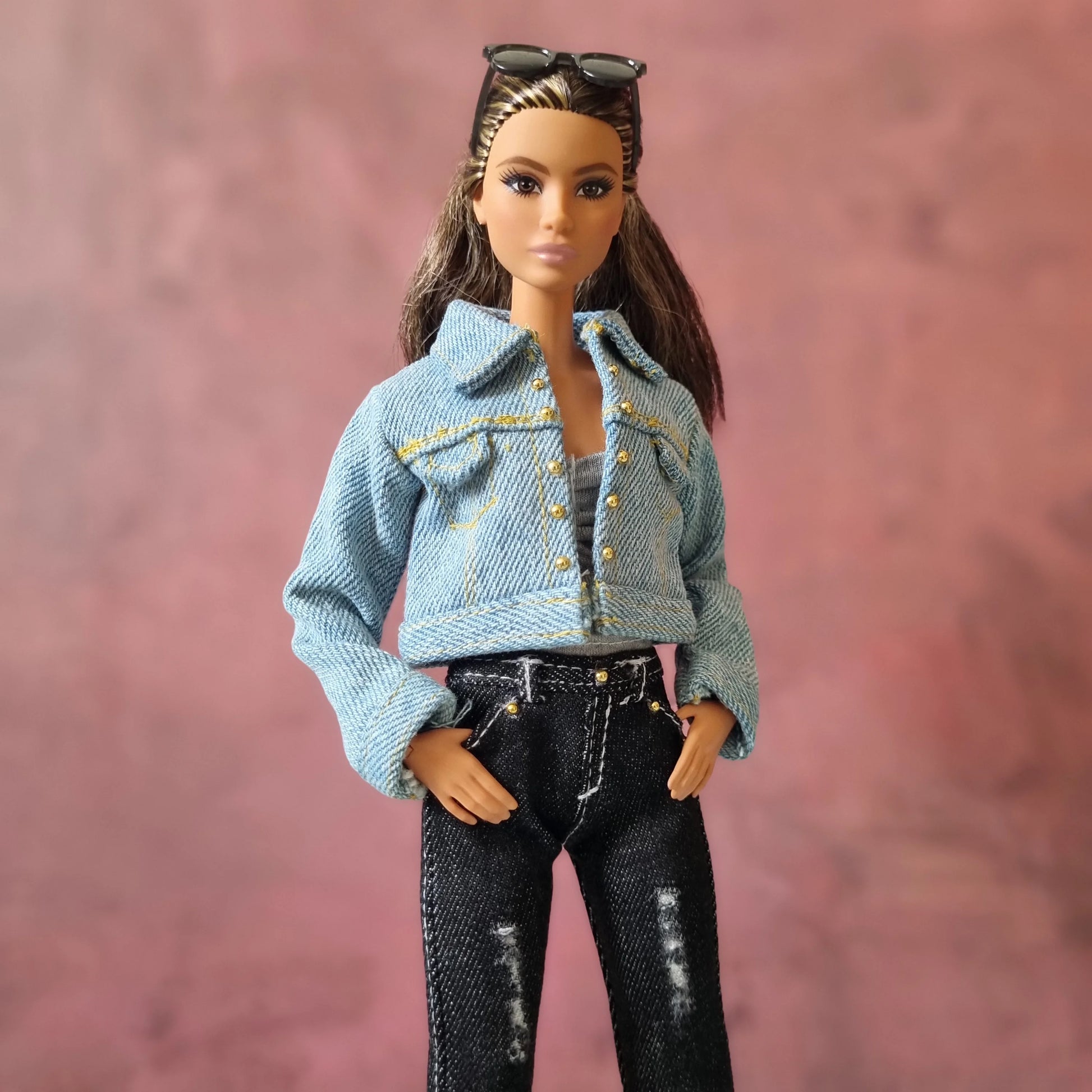 Fashion doll wearing a detailed blue denim jacket, and distressed black jeans for sale.