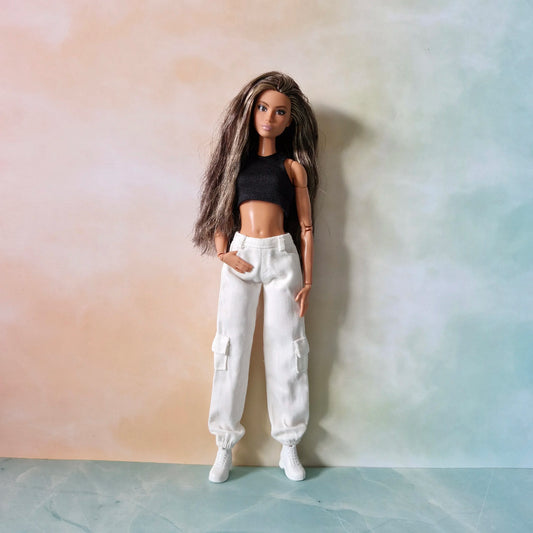 Black crop top and white cargo pants with side pockets and elastic cuffs for Barbie doll