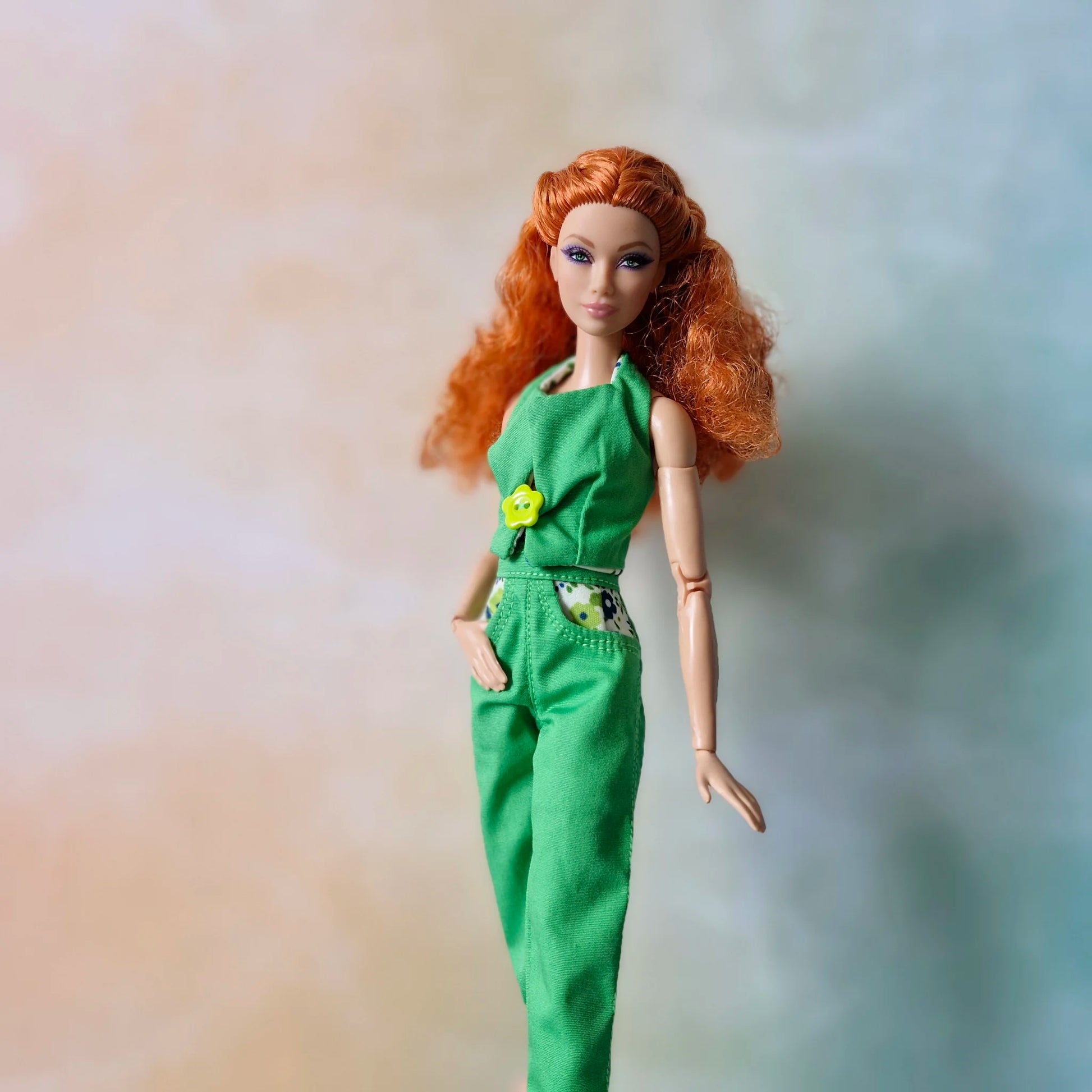 Redhead 11.5 inch fashion doll wearing handmade green capri pants and reversible solid green halter top