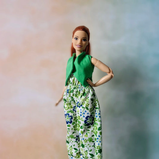 Redhead curvy fashion doll wearing handmade floral jumpsuit and green vest outfit