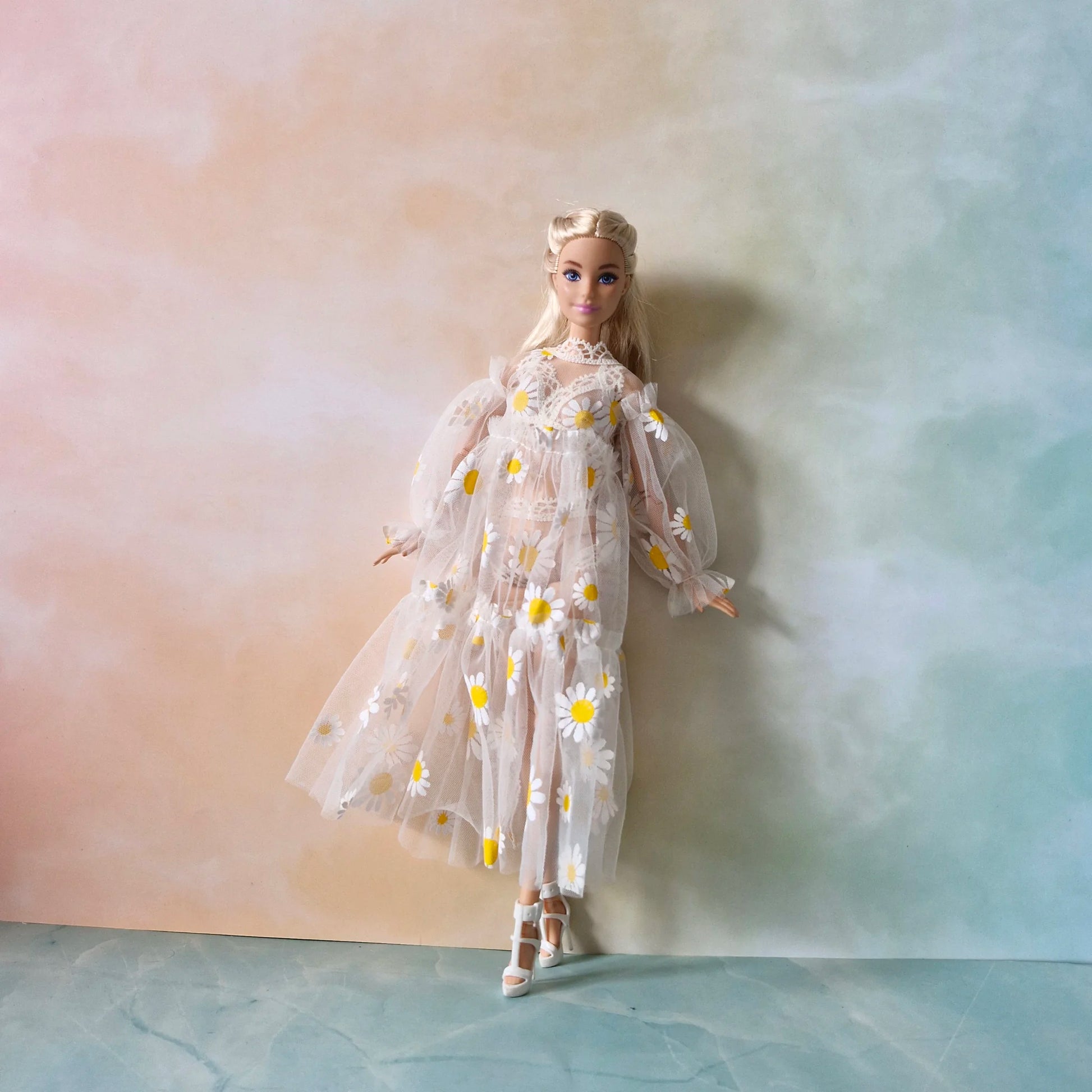 Full length view of Barbie doll in sheer daisy robe and bikini set with white shoes
