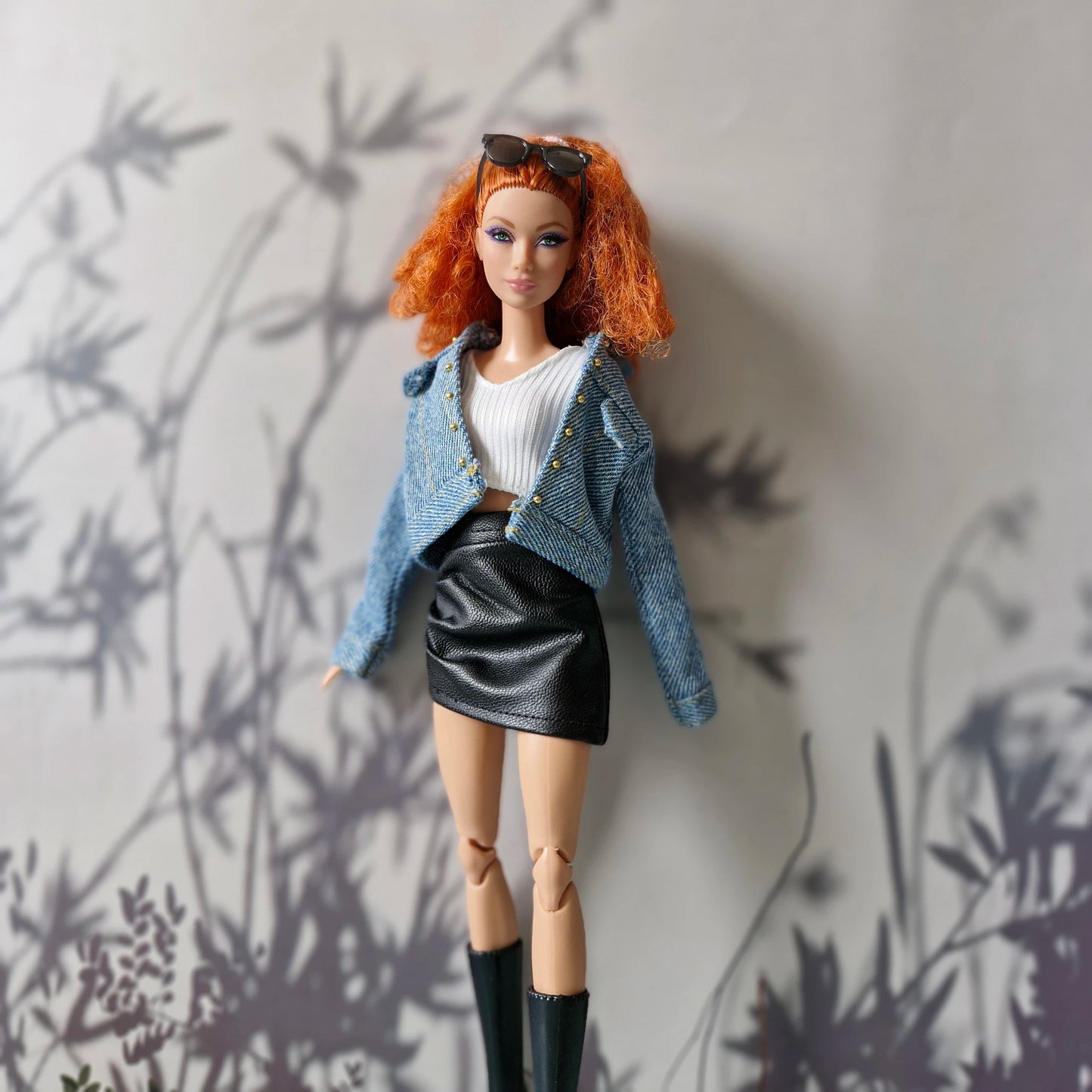 Barbie outfit set with denim jacket, ribbed white top, and black faux leather skirt