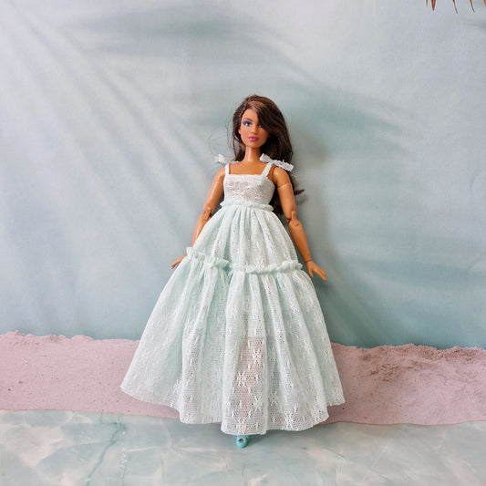 Close up of handmade mint lace dress for Barbie fashion dolls
