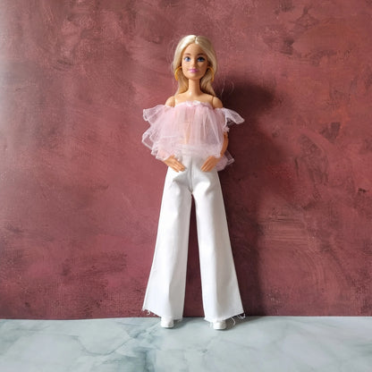 Barbie doll wearing pink sheer top and white wide-leg pants outfit - doll clothes