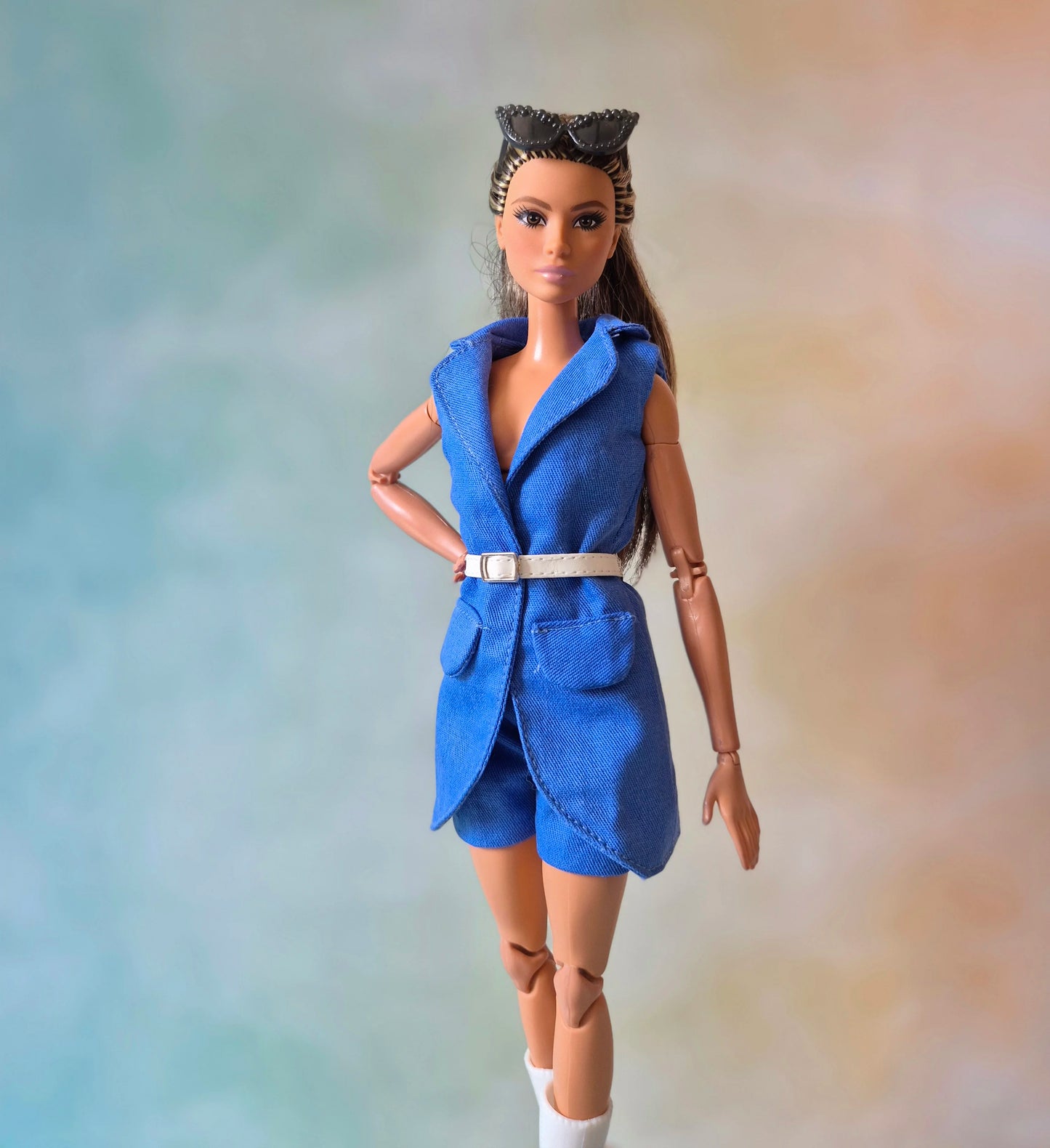 Blue sleeveless blazer, blue bra and short sets for Barbie doll.