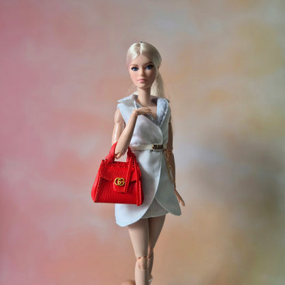 Barbie wear blazer , white pant and red handbag