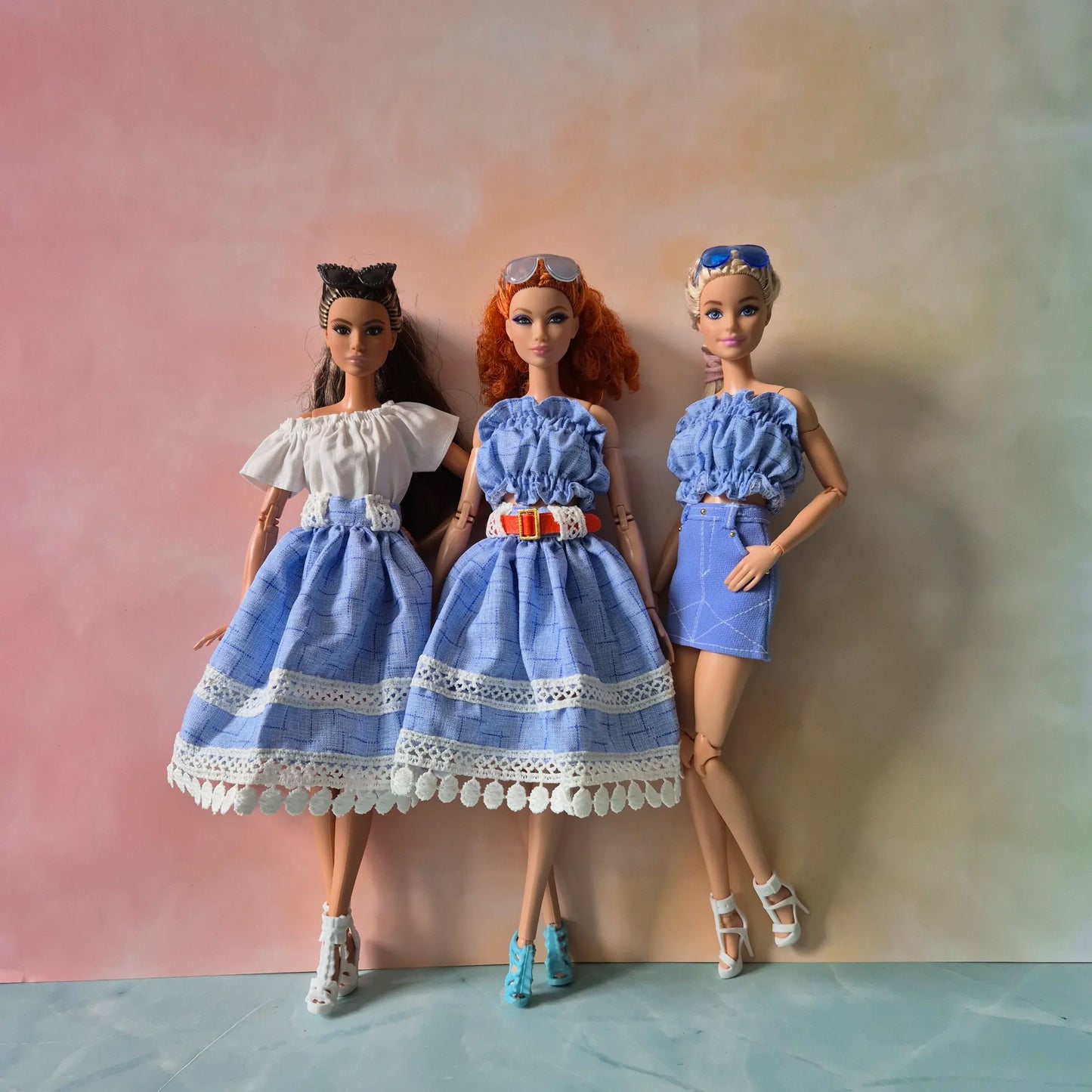 White top and blue skirt for barbie doll