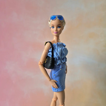 White top and blue skirt for barbie doll