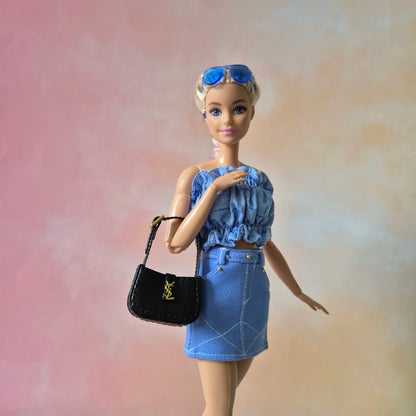 White top and blue skirt for barbie doll