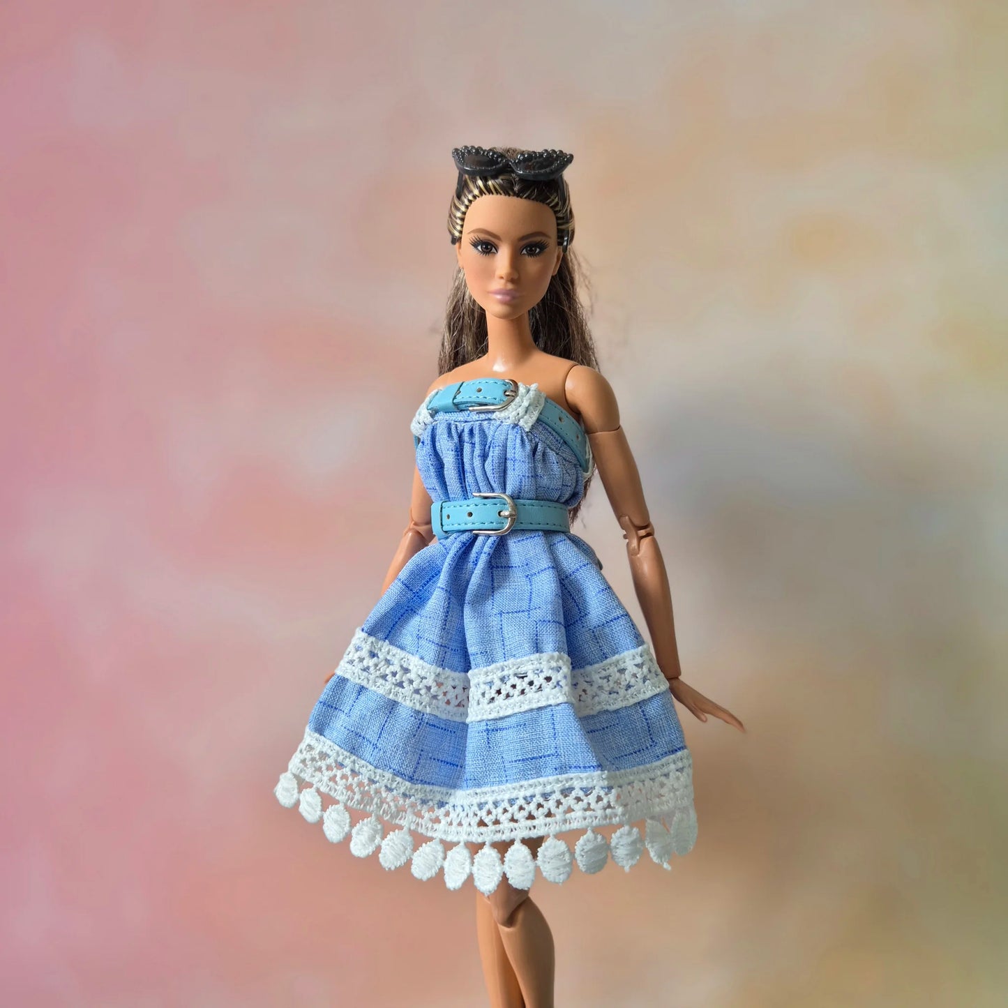 White top and blue skirt for barbie doll