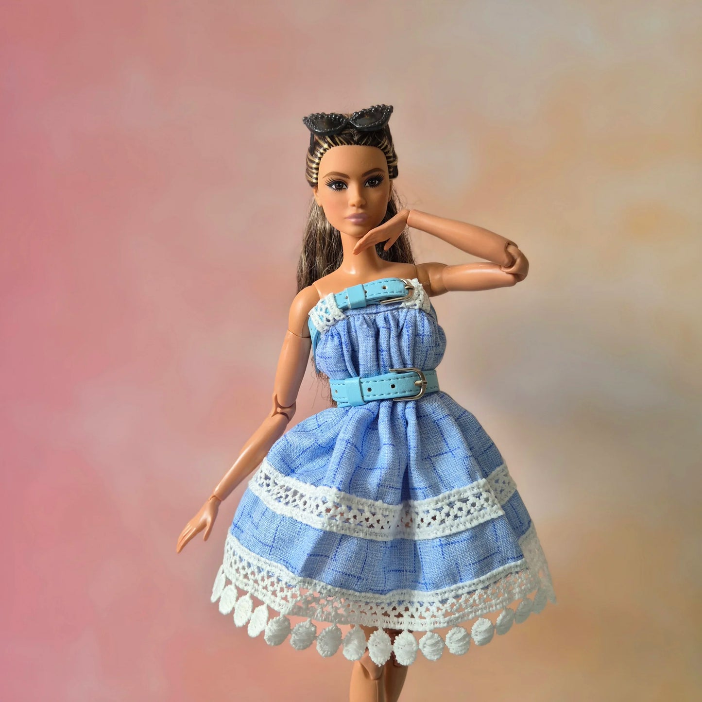 White top and blue skirt for barbie doll