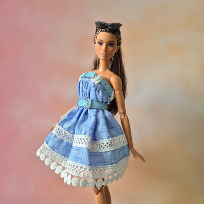 White top and blue skirt for barbie doll