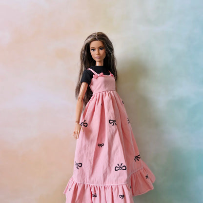 Barbie wearing black top and pink bow maxi dress – doll fashion outfit set
