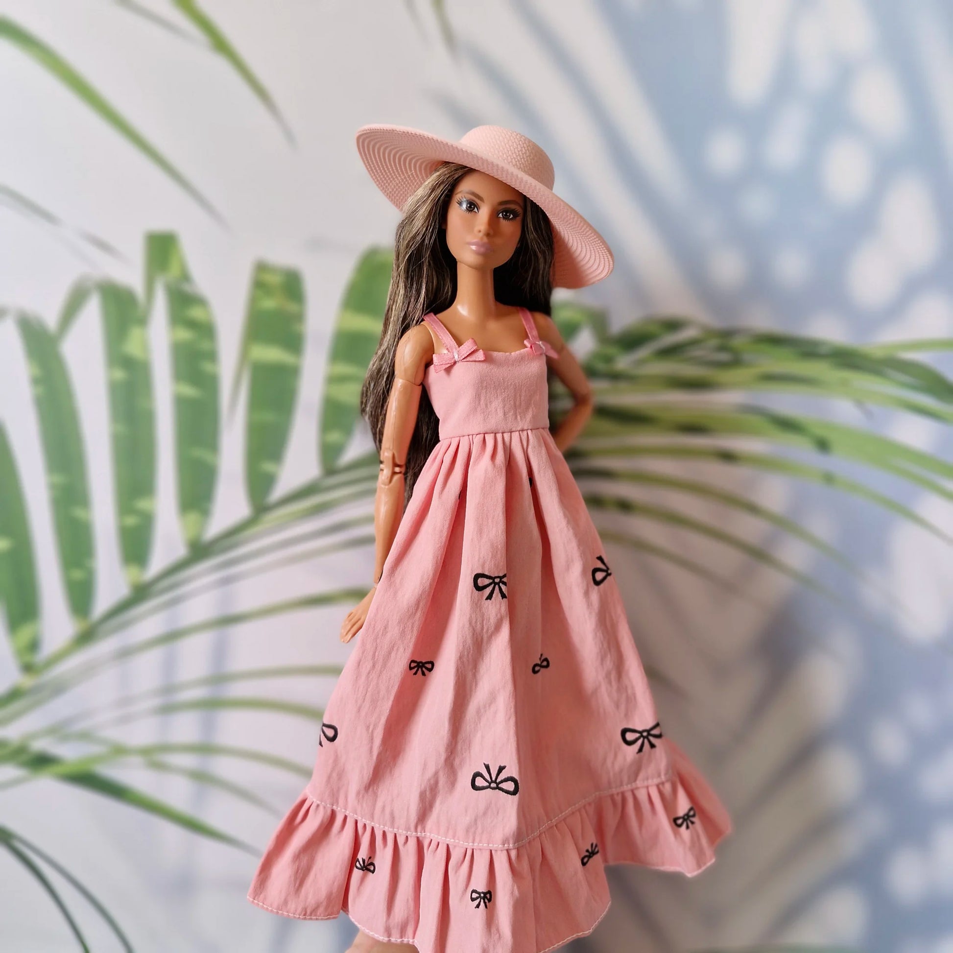 Barbie doll in pink bow dress – stylish dress for Barbie with black t-shirt underneath