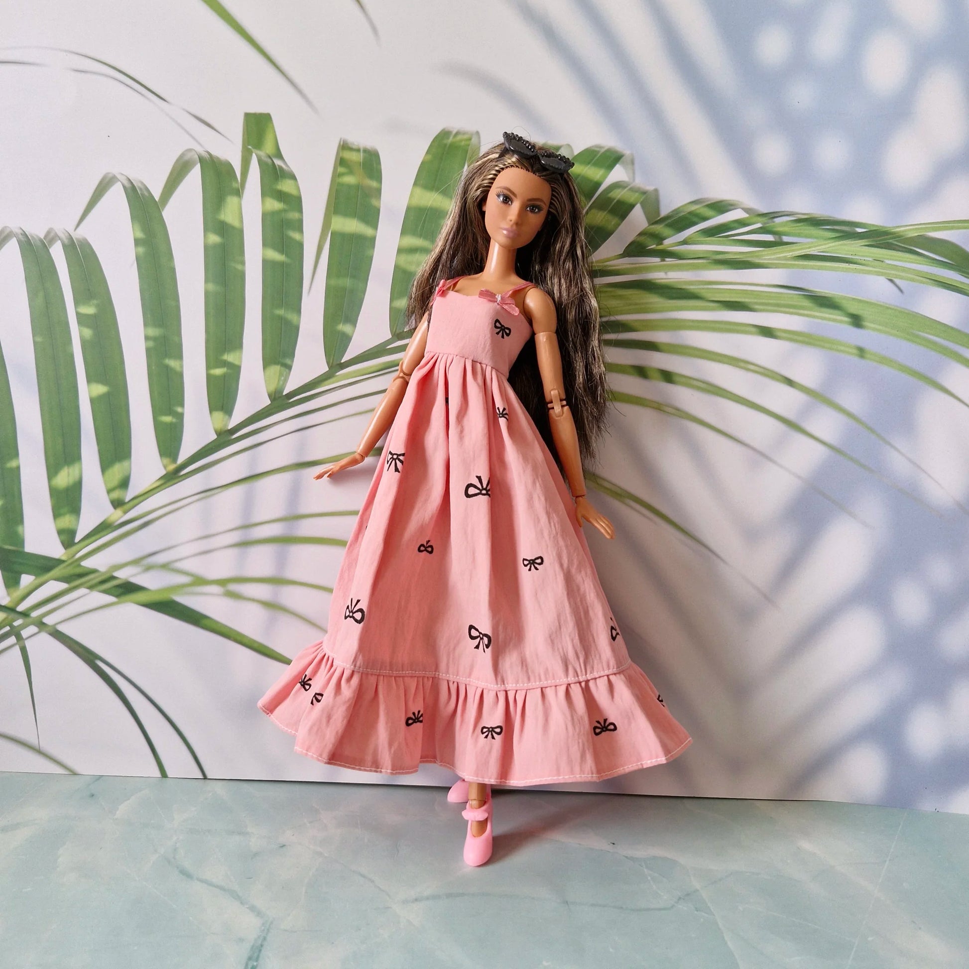 Barbie doll in pink bow dress – stylish dress for Barbie with black t-shirt underneath