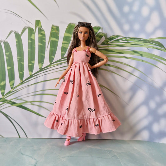 Barbie doll in pink bow dress – stylish dress for Barbie with black t-shirt underneath