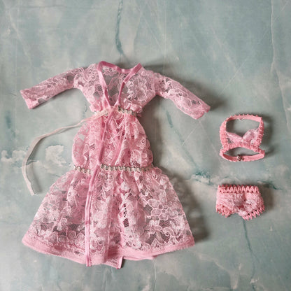 Details of pink lace Barbie doll robe, bralette, and panties from the 3-set collection.