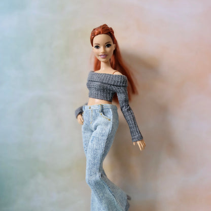 Curvy Barbie with gray knit off-shoulder crop top and faded jeans