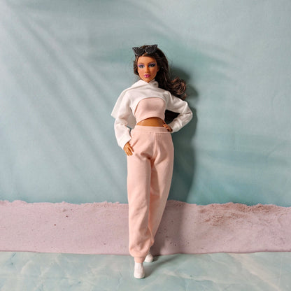 Stylish Barbie doll in pink sweatpants and white hoodie fashion pack