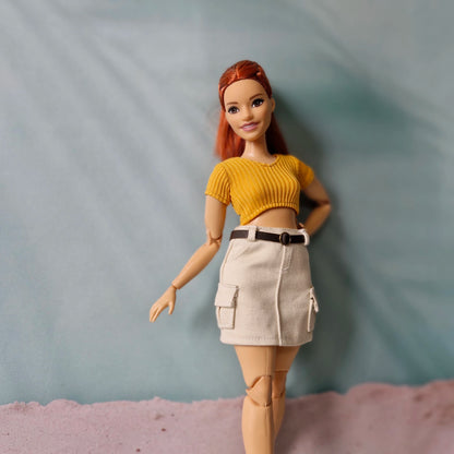 Curvy doll with red hair wearing trendy mix and match separates outfit