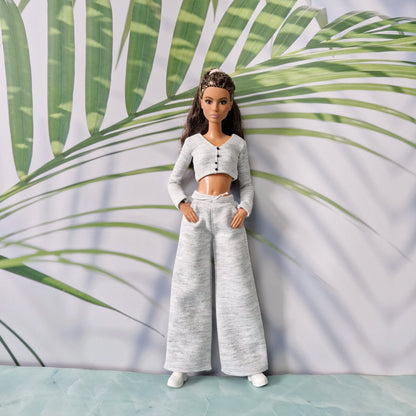 Barbie doll wearing grey long sleeve cropped cardigan and wide leg pants