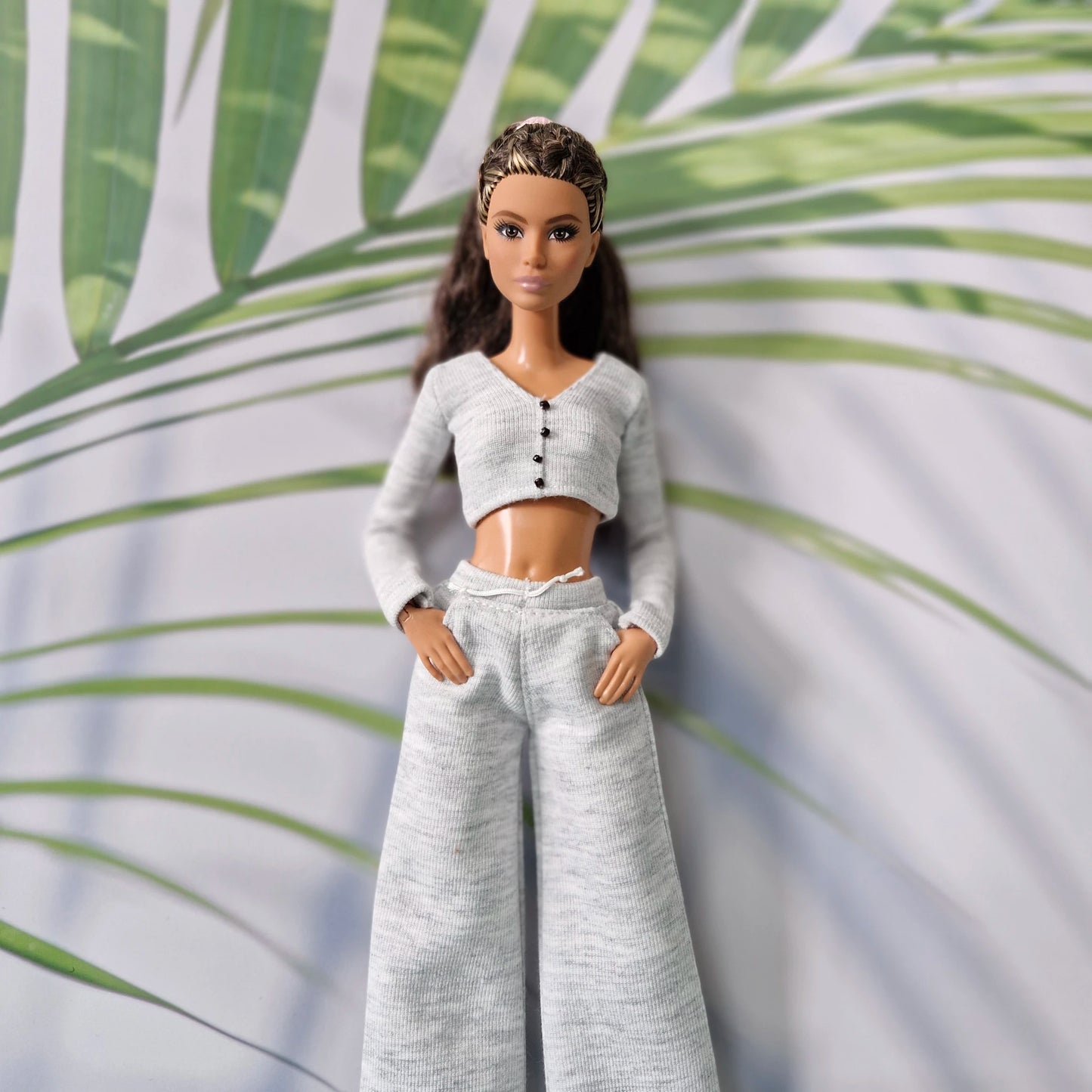 Close up of Barbie in grey handmade loungewear cardigan and sweatpants