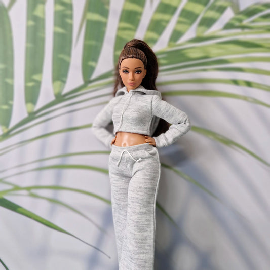 Barbie doll wearing grey cropped hoodie and wide leg sweatpants outfit