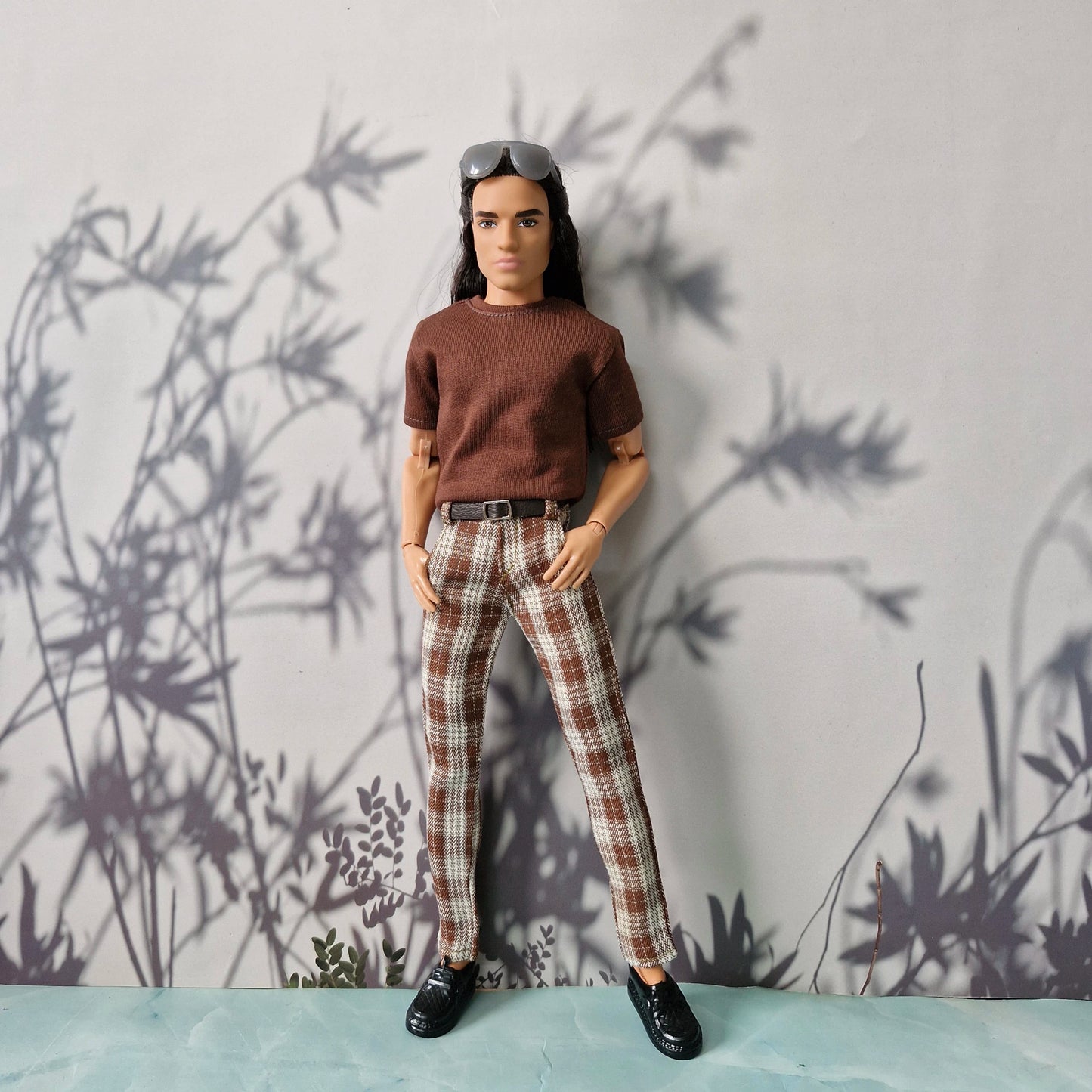 Ken doll (long hair) modeling a handmade t-shirt for 1:6 scale Ken fashion dolls