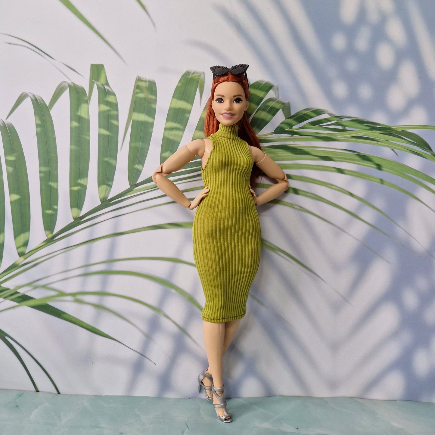 Close up of a Curvy Barbie in a beautifully tailored hoodless dress