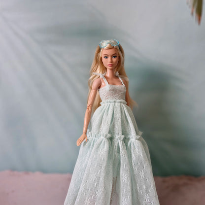 Close up portrait of Barbie doll wearing handmade mint lace maxi dress