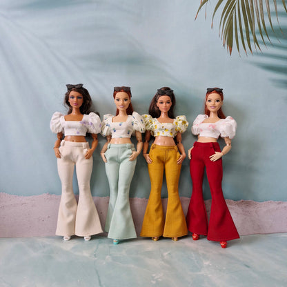 Group photo of Curvy Barbie fashion outfits with colorful flared pants and floral tops