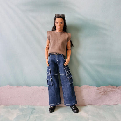 Ken doll dressed in streetwear fashion featuring a brown sleeveless muscle tee and dark blue wide-leg cargo jeans.