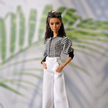 Trendy clothes for Barbie featuring a black and white gingham shirt and tailored white wide-leg pants.