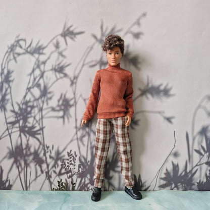 Stylish clothes for Ken featuring a brown long-sleeve turtleneck and tailored plaid pants.