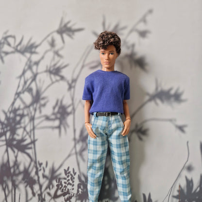 Casual fashion for Ken showcasing a comfortable blue shirt and trendy blue plaid trousers.