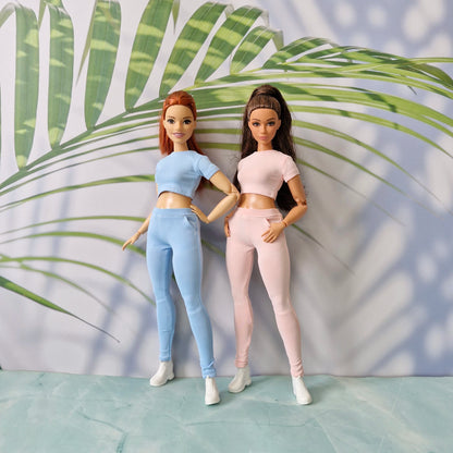 Fashion dolls modeling interchangeable ribbed tops and pants in blue and pink for Barbie and for Curvy.