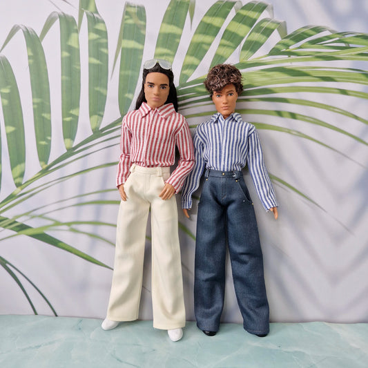 Full body view of two Ken dolls modeling custom handmade striped shirts and wide-leg pants.