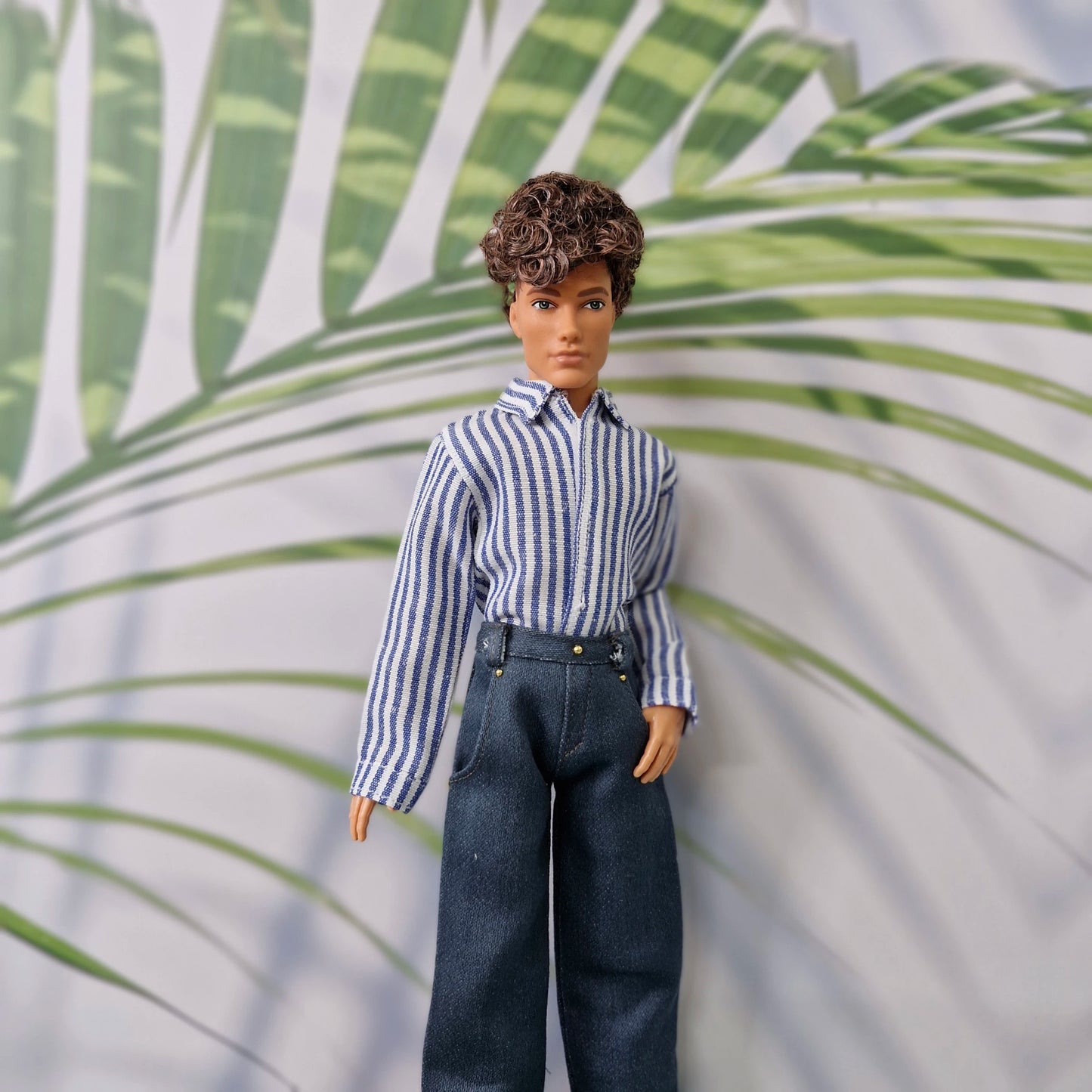 1/6 scale male fashion doll modeling a custom blue striped collared shirt and dark pants.