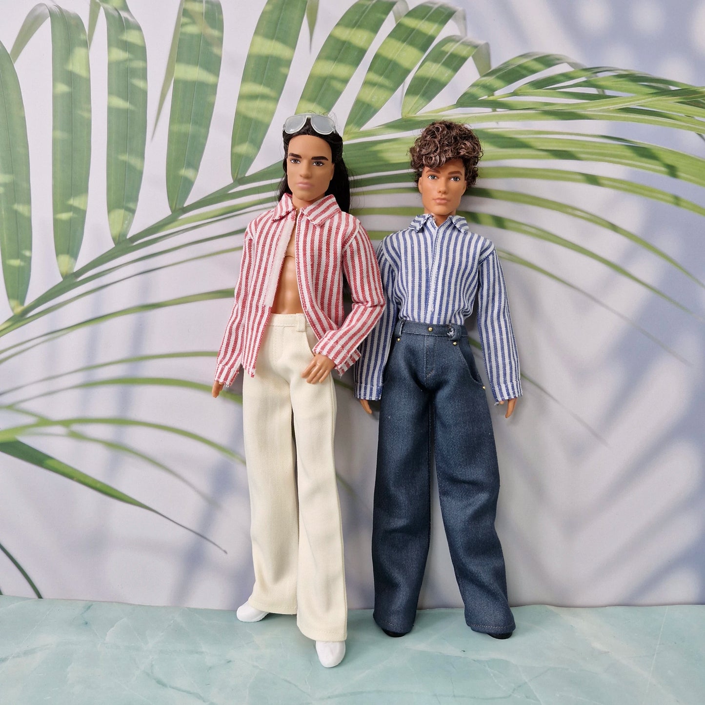 Two Ken dolls displaying handmade 1/6 scale striped shirts and tailored trousers.