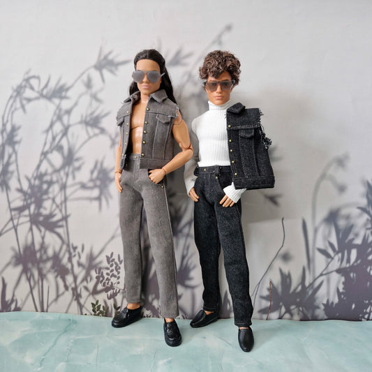 Two Ken fashion dolls modeling handmade streetwear: a full grey denim look, and a white turtleneck paired with dark denim.
