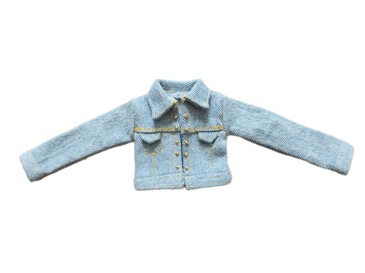Cropped light blue jean jacket with gold stud details for fashion dolls.