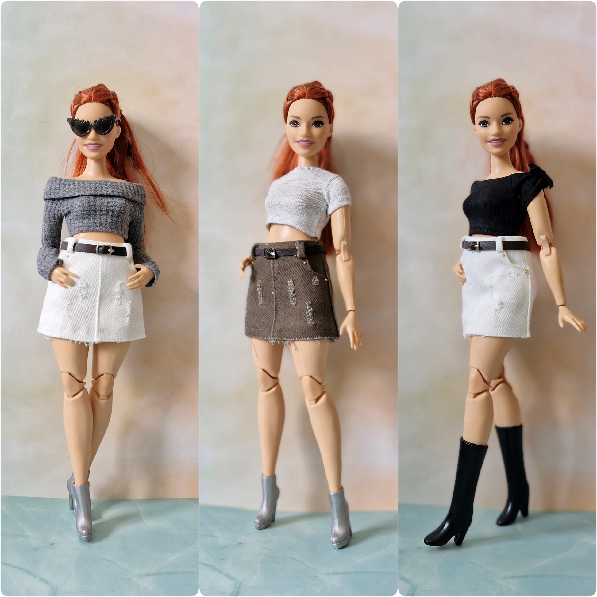 Three dolls with different outfits on a plain background