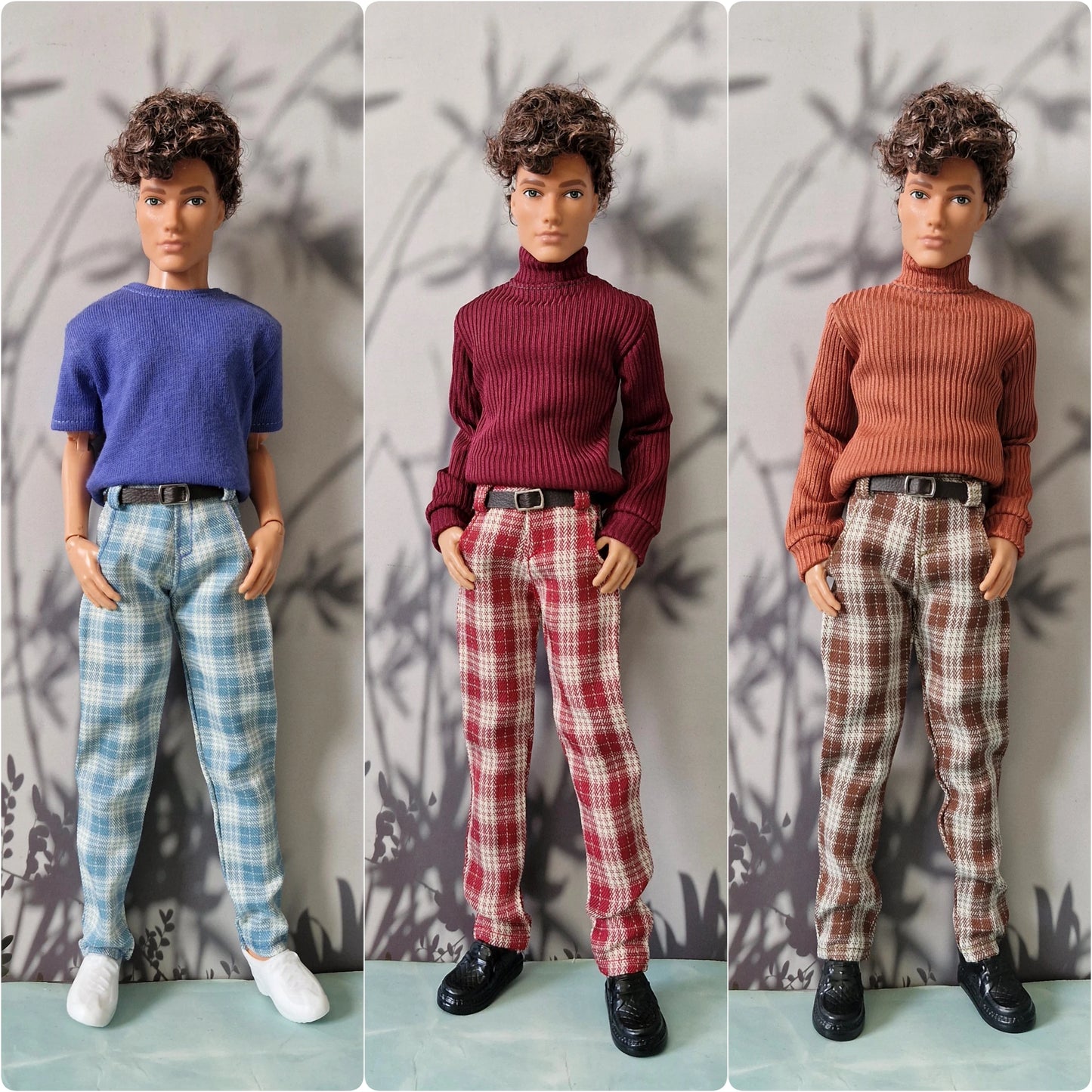 Three dolls with short curly brown hair are shown side by side wearing different color options of a ribbed turtleneck sweater and plaid pants. The left doll wears a blue sweater and light blue plaid pants, the middle doll wears a burgundy sweater and red plaid pants, and the right doll wears a rust orange sweater and brown plaid pants.