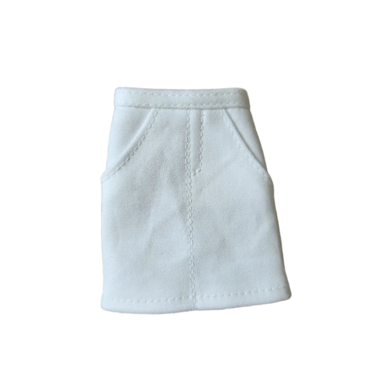White denim-style mini skirt with pocket details for Barbie doll clothes.