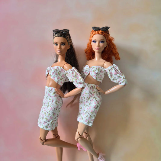 two barbie wear crop top and skirt sets