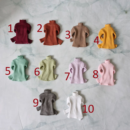 Numbered color chart showing 10 options for Curvy Barbie ribbed turtleneck sweaters including pink green yellow and neutrals