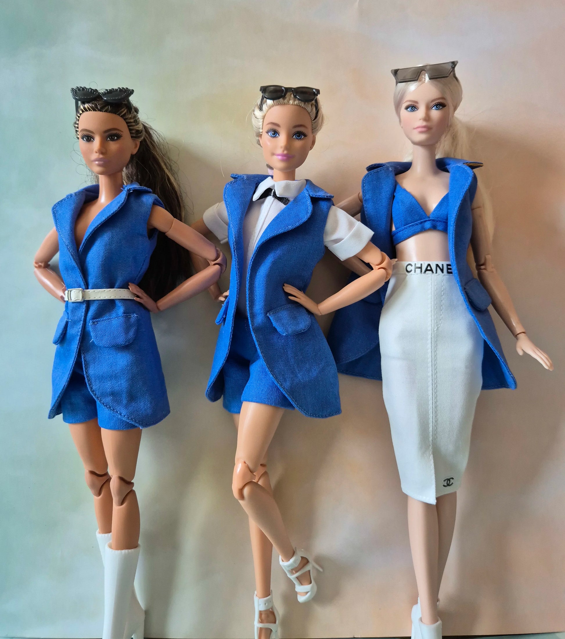 Blue sleeveless blazer, blue bra and short sets for Barbie doll.